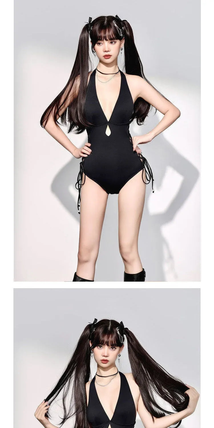 Black women's one-piece swimsuit with V-neckline and hollow strap design on mannequin