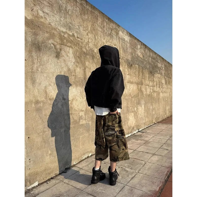 Men's camouflage cropped jeans with patch ripped detailing and loose straight-leg cut