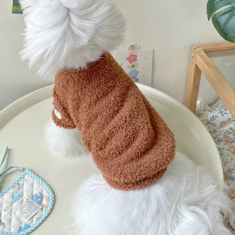 Brown double-sided cloud velvet dog jacket on a small dog, showing plush texture and fit.