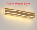 Solid wood LED wall light with rubber wood frame and acrylic diffuser in log colour