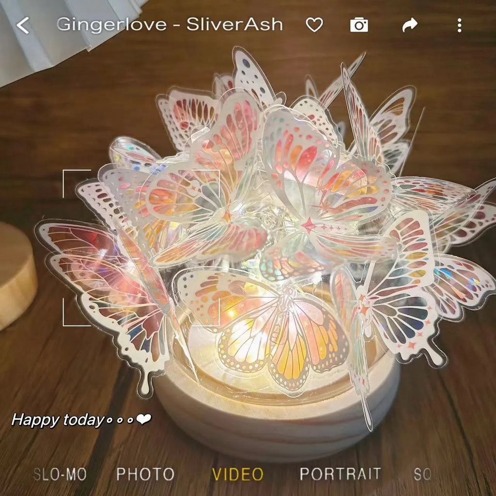Handmade butterfly night lamp with glass shade on raw wood base measuring 12x15cm