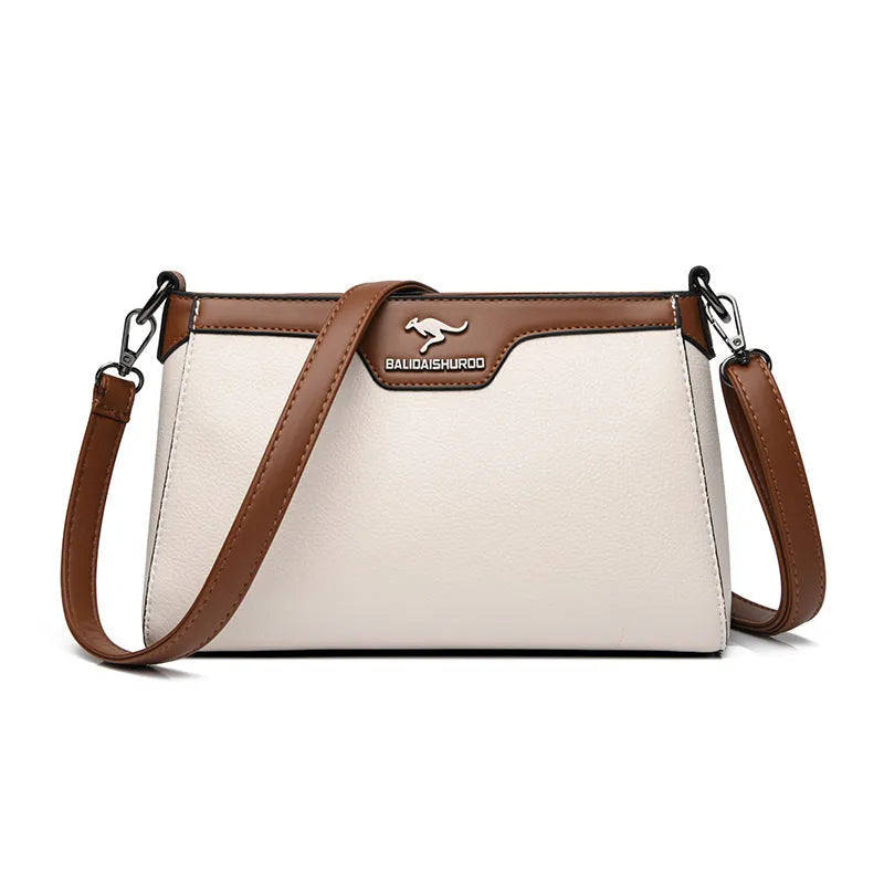 One shoulder soft PU small square stitching women's cross-body bag in black with contrast colour details and double strap