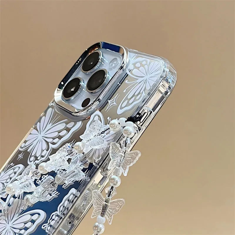 Clear iPhone 15 Pro Max case with 3-in-1 mirror and bow decoration on transparent TPU