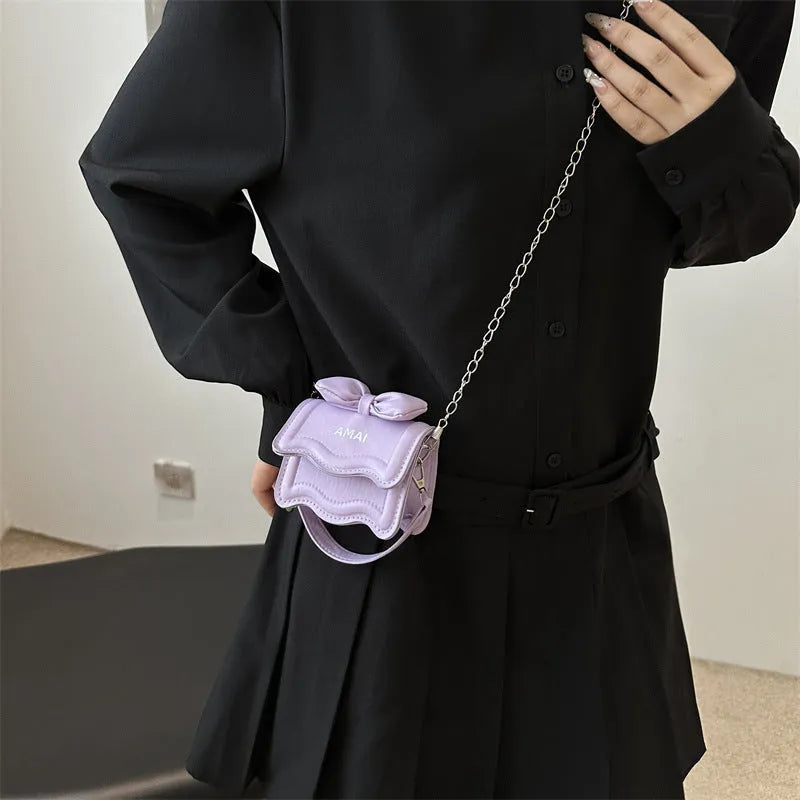 Mini PU crossbody bag in seven colour options with adjustable shoulder strap