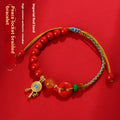 Hand-woven cinnabar peace buckle bracelet in emperor red sand colour with geometric pattern
