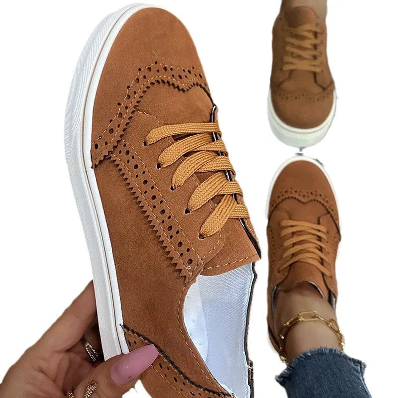 Women's canvas round toe slip-on flat shoes in solid colour with rubber sole, low top design