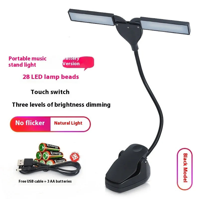 Black rechargeable music stand lamp with 28 LEDs and USB cable on a music stand.