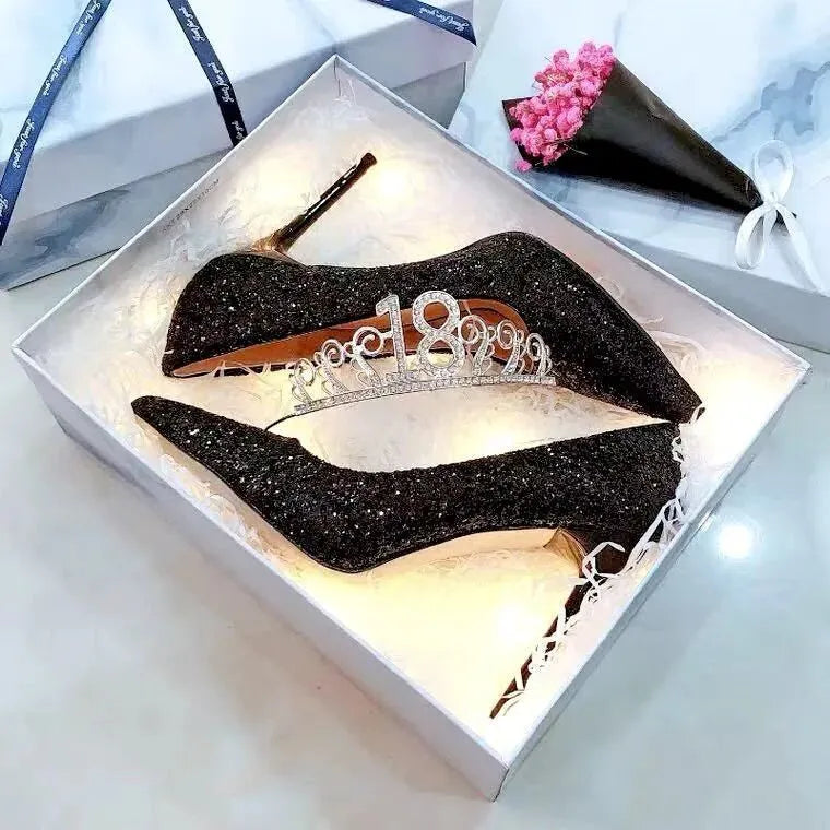 Silver crystal stiletto wedding shoe with PU upper and 7cm heel on a light background