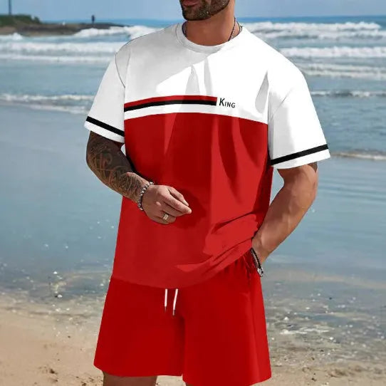 Man wearing a loose fit light blue short-sleeved t-shirt and matching shorts summer set.