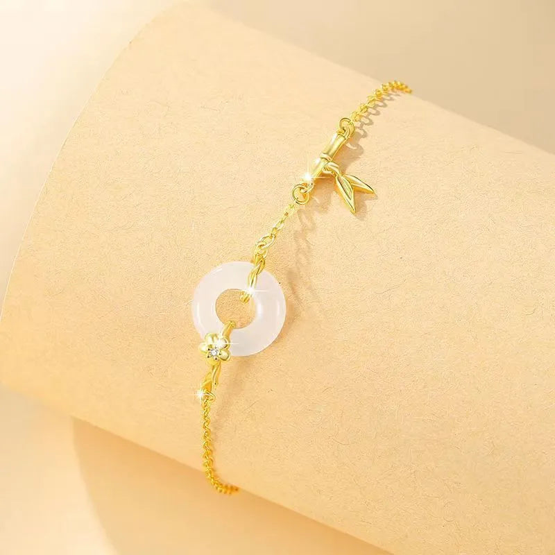 Silver gold bracelet with peace buckle clasp and white chalcedony starry sky design elements