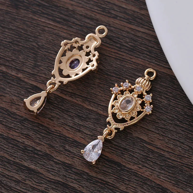 Small crown hollow water drop pendant with micro inlaid zircon details in five colours.