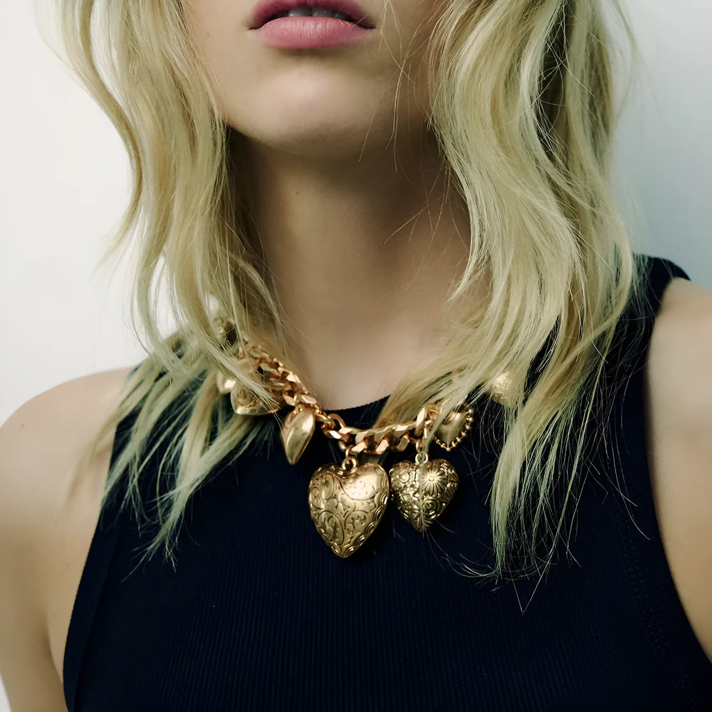 Gold alloy carved heart pendant necklace on adjustable metal chain