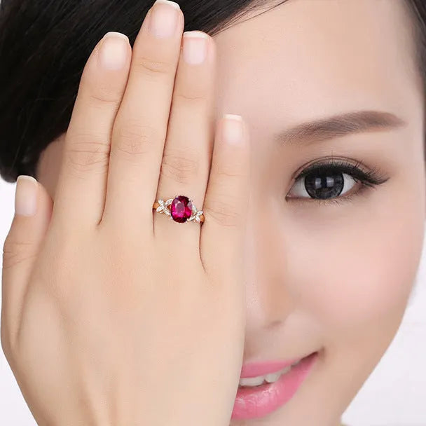 Women's butterfly ring with heart design in 18k rose gold plating, red and blue colour options