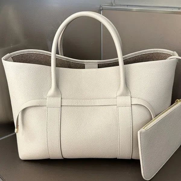 Women's genuine leather single shoulder handbag in horizontal square shape with stitching detail