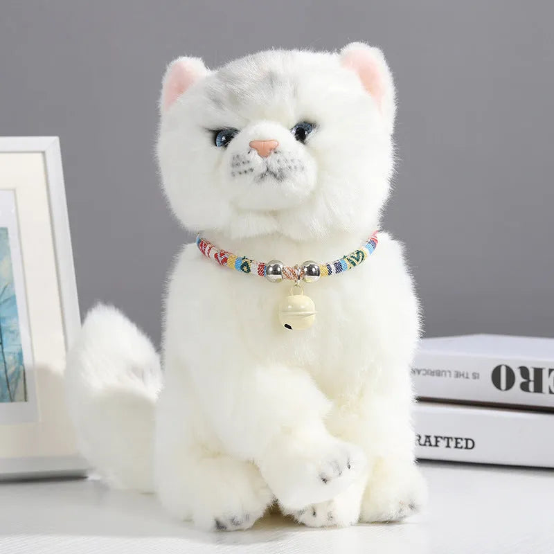 An adjustable ethnic-style pet collar with a metal buckle and bell, shown in various colours.