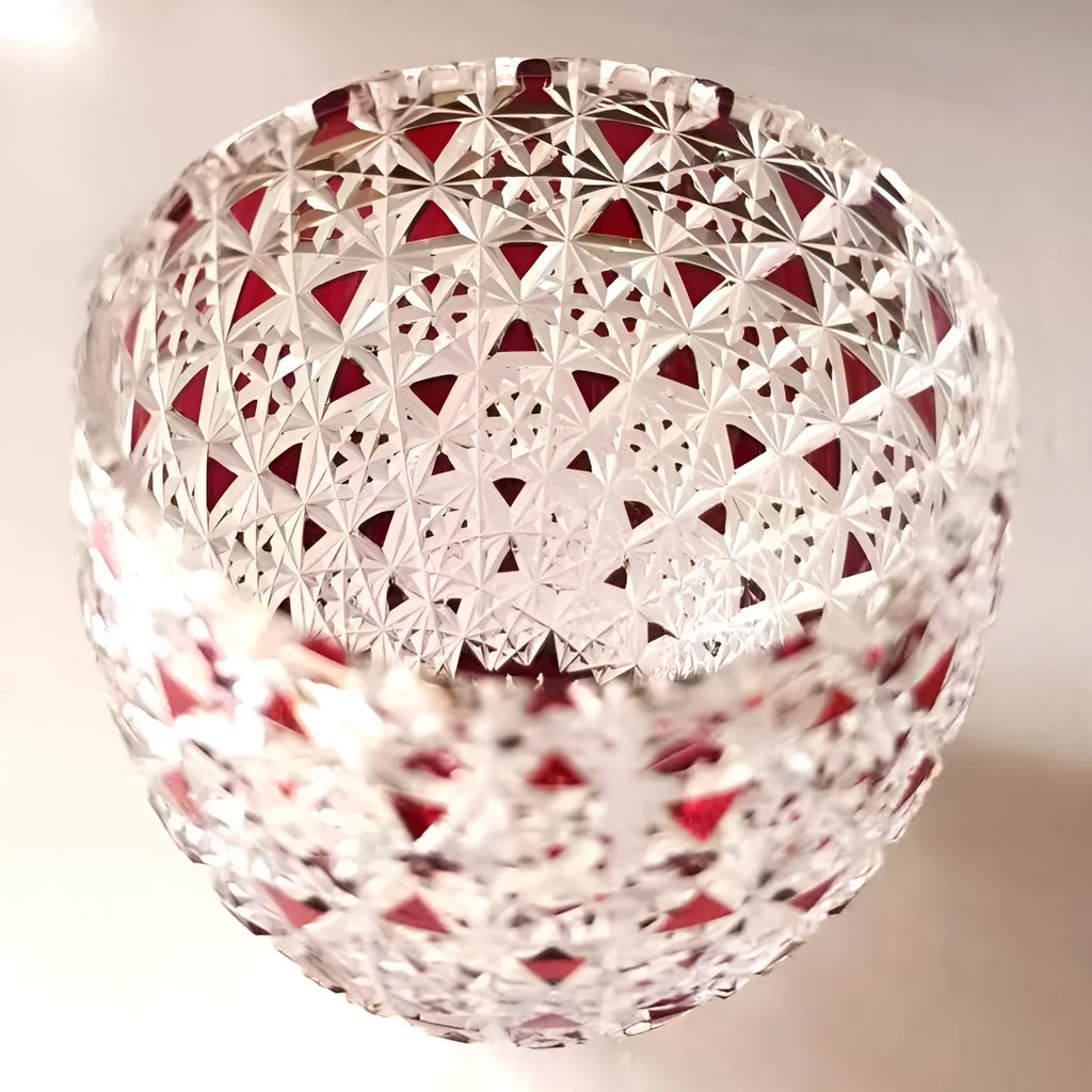 Japanese-style hand carved red crystal glass cup with cylindrical shape and carved pattern