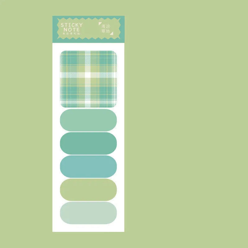 Set of colourful sticky note memo pads in eight designs including plaid and solid colours.