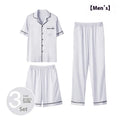 Men's ice silk three-piece home wear suit in black with short sleeves, shorts, and trousers laid flat
