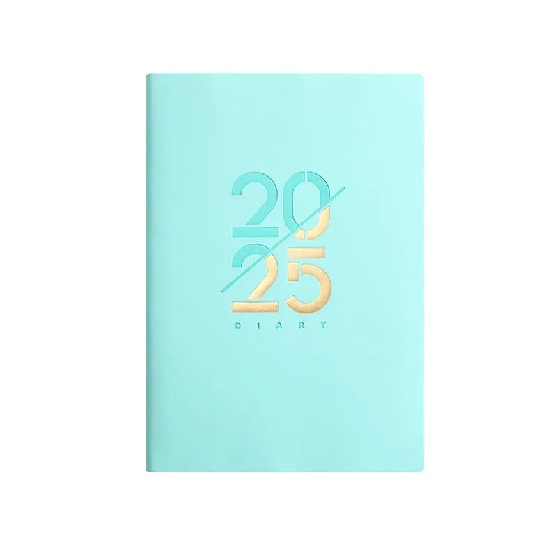 A5 daily planner notebook with soft faux leather cover in blue, lying open on a table.