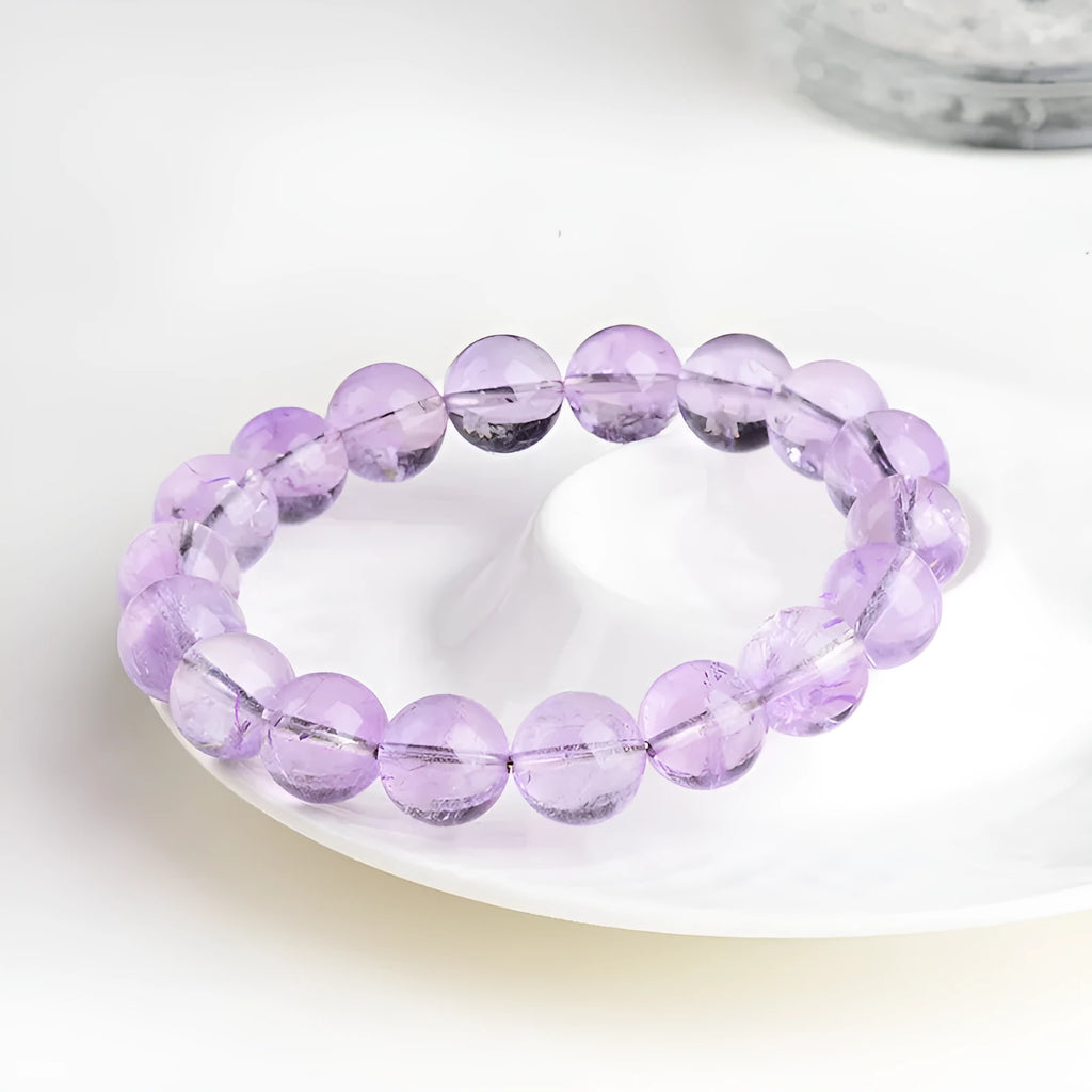 Lavender amethyst crystal bracelet with round beads in water ripple geometric design