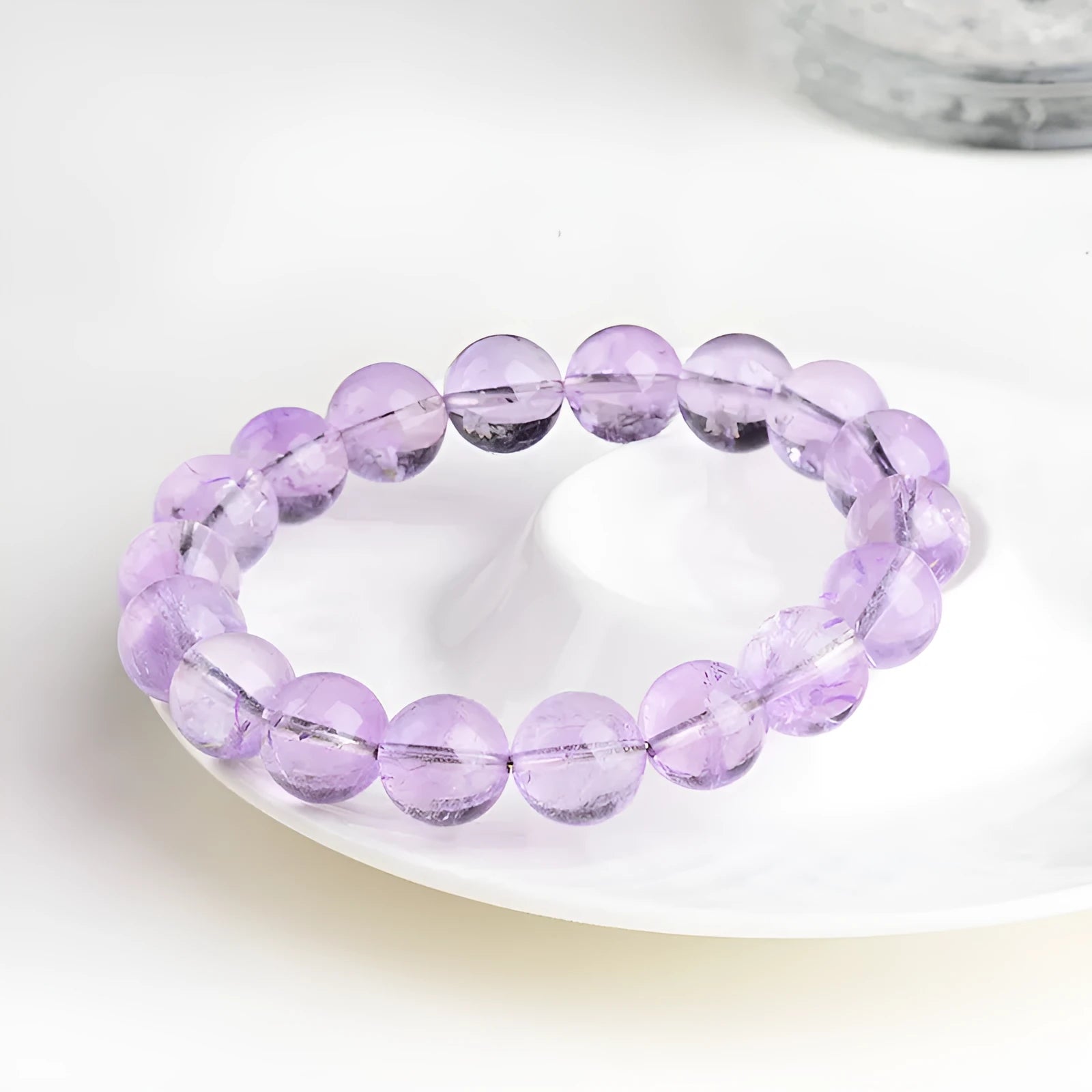 Lavender amethyst crystal bracelet with round beads in water ripple geometric design