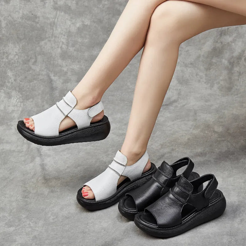 Peep toe women's casual sandals in cowhide leather with raised bottom sole, fish mouth toe, low top, black colour