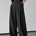 Black men's casual trousers with vertical stripes and front pleats made from rabbit hair and bamboo fibre.