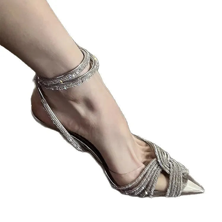 Silver transparent cross rhinestone pointed high heels 8cm with slingback strap on display