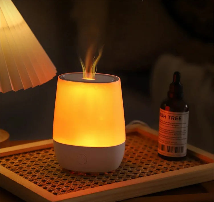 White USB aroma diffuser with flame simulation effect showing water tank and Type-C port