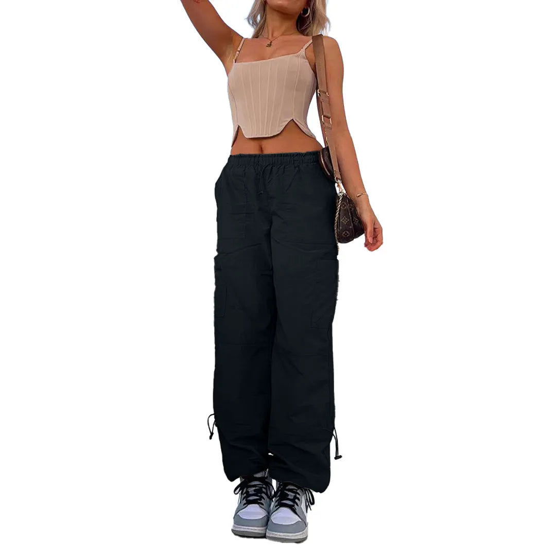 Multi-pocket straight-leg cargo casual pants in a light blue colour on a neutral background.