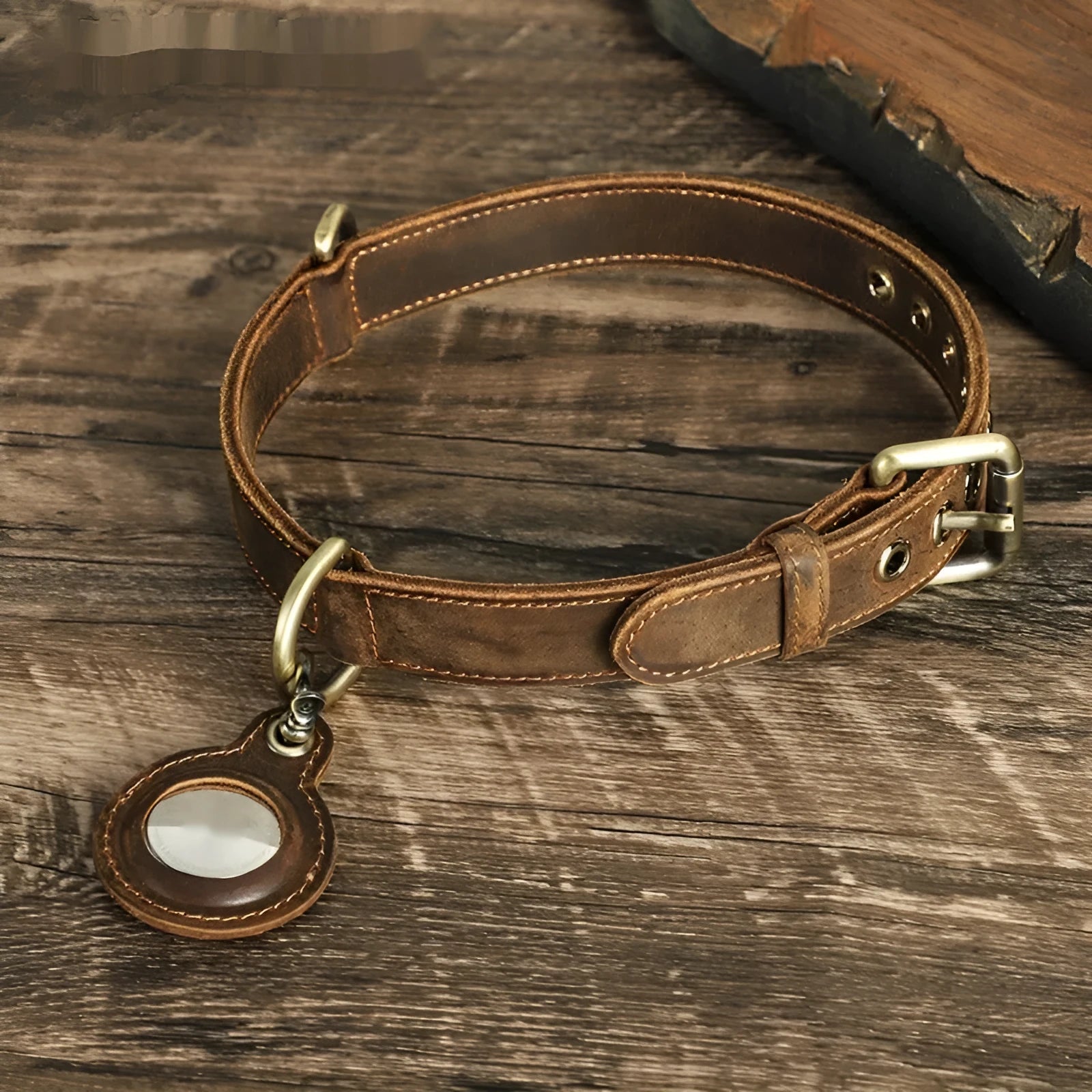 Brown handmade genuine cowhide leather dog collar shown on a flat surface.