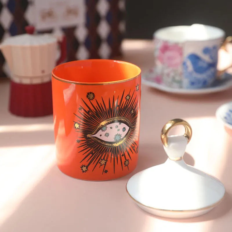 Big Eyes ceramic candle holder in blue with decal figures and gods, used as candle cup and jar storage