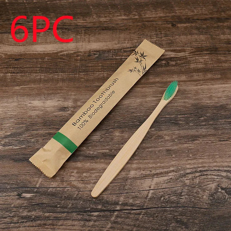 Set of 10 bamboo toothbrushes in multiple colours showing natural bamboo handles and soft bristles