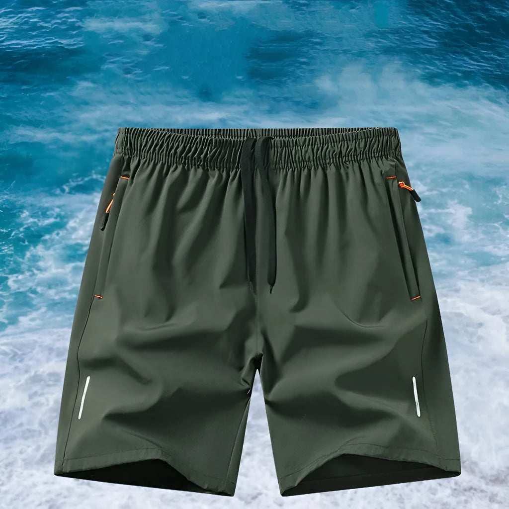 Man wearing loose-fit black ice silk basketball shorts for summer sports training.