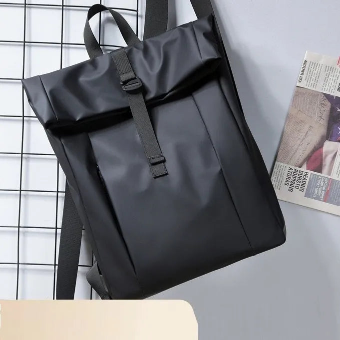 Solid colour large capacity men's backpack with airpillow straps, available in black, blue, and silver, 30x11x42cm