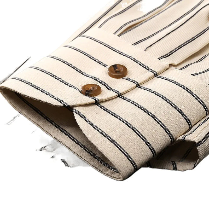 Coffee coloured striped men's long-sleeved shirt with slim fit on a hanger.