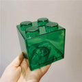 Plastic building blocks piggy bank cube shape 9x9x8.8 cm five colours