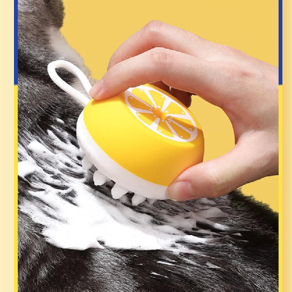 A soft silicone pet bath brush in yellow, shown with both a combed hair side and a 3D massage head side for dog and cat grooming.