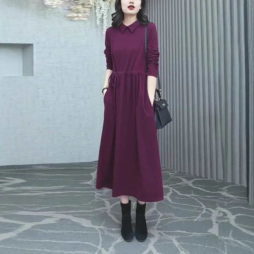 Purplish red plus size women's long sleeve dress with a long skirt for autumn winter wear.