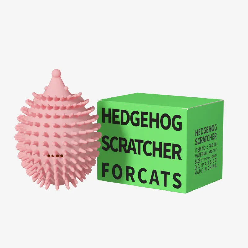 Green plastic cat corner scratcher with a cat teaser stick placed on a wooden floor
