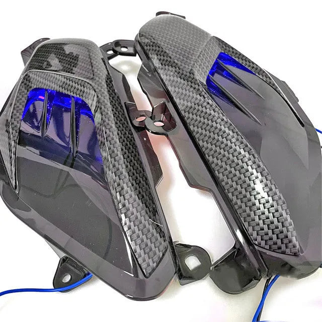 Pair of YAMAHA NMAX carbon fibre side lamps with LED lights in choice of blue or red