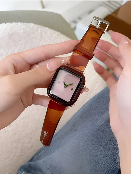 Brown transparent silicone Apple Watch strap showing clear construction and band attachment mechanism