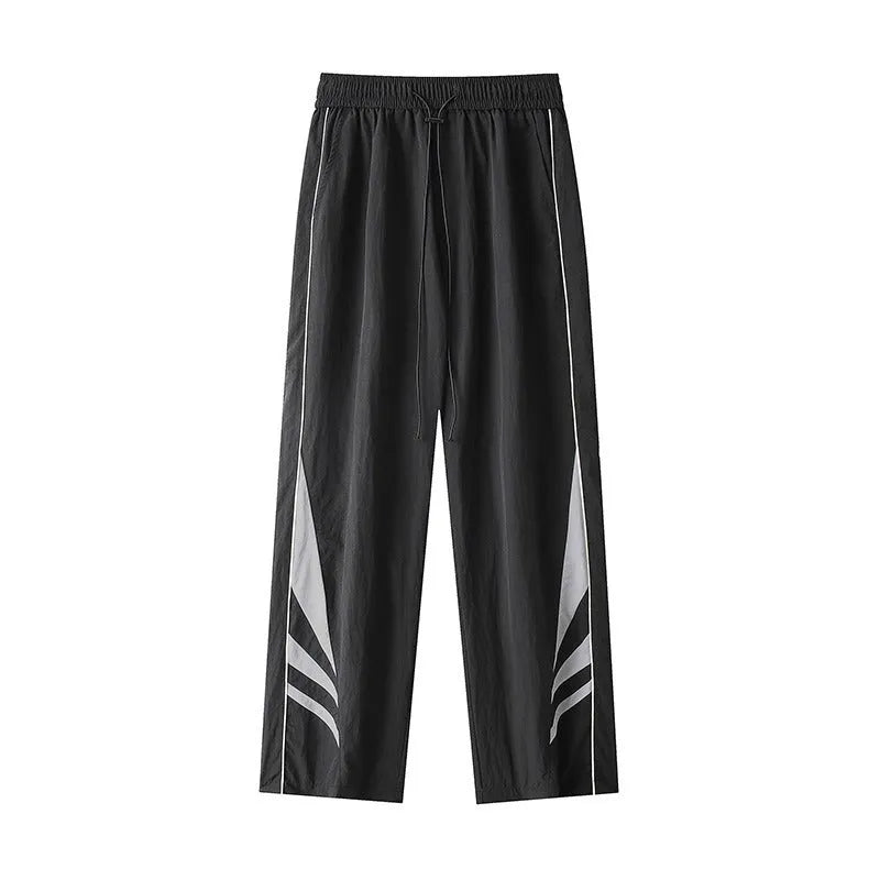 Men's black straight-leg summer trousers with an elastic waistband on a plus-size model