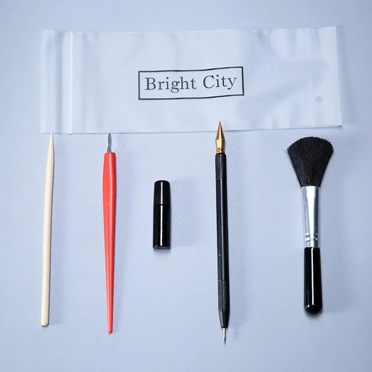Scratch painting tools kit showing healing pen models, scrapers, brushes, and photo frames for creative art projects