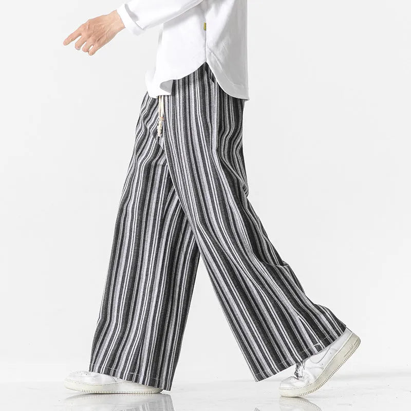 Vintage stripe loose straight mopping trousers in cotton blend fabric showing straight leg opening
