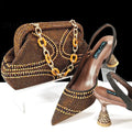 Women's pointed toe high heel shoes and matching bag with rhinestone decoration and wine glass heels