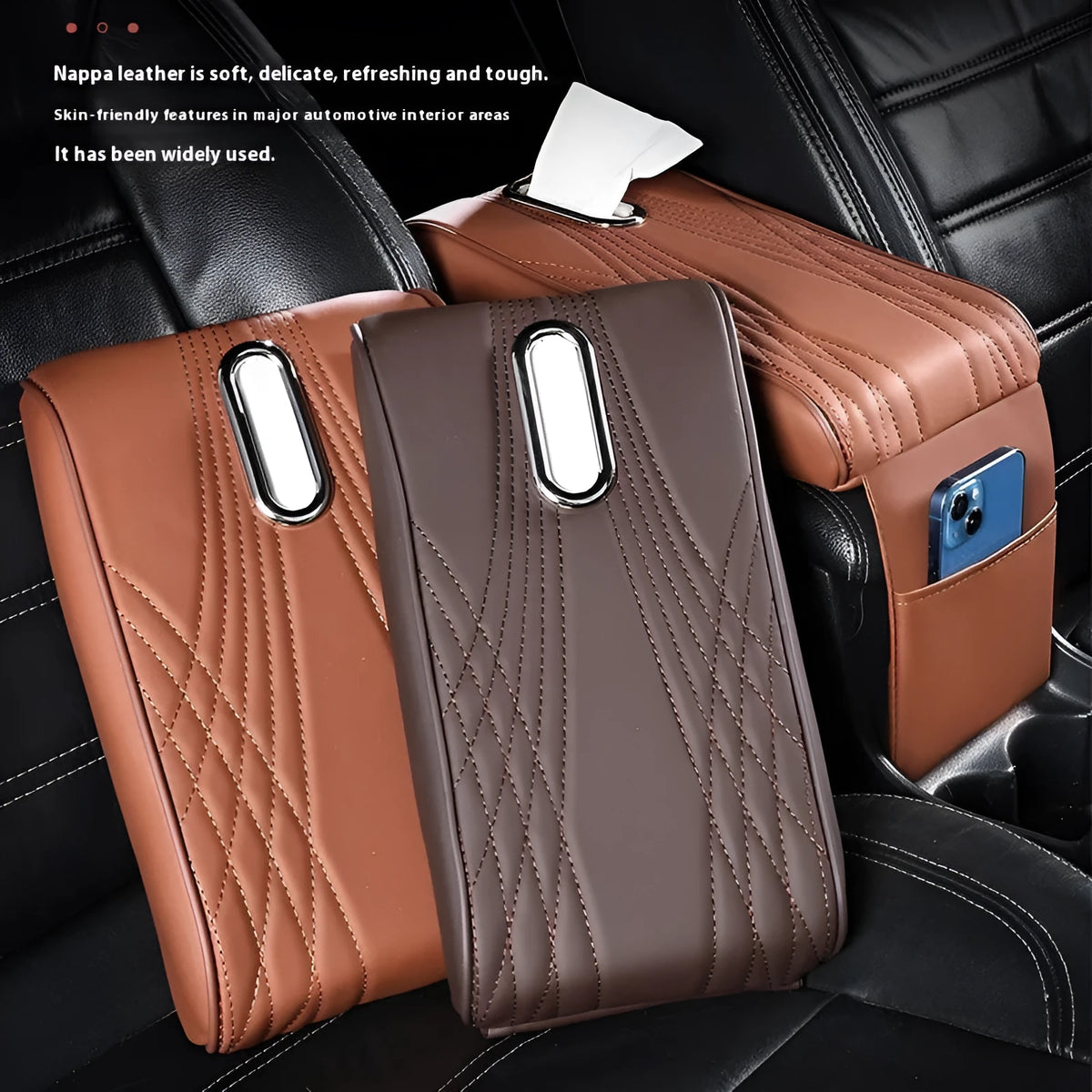 Black leather car armrest cover with angel pattern tissue pocket placed on a vehicle center console