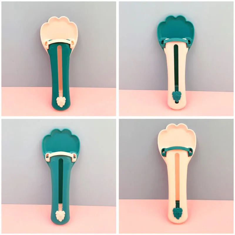 Green and pink pet feed spoon for snack extrusion and cereal dispensing with squeezer feeder design