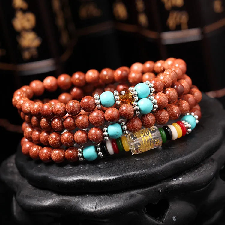 Golden star stone colour multi-circle bracelet with 108 nugget sand beads, mantra charm and fu character ornament