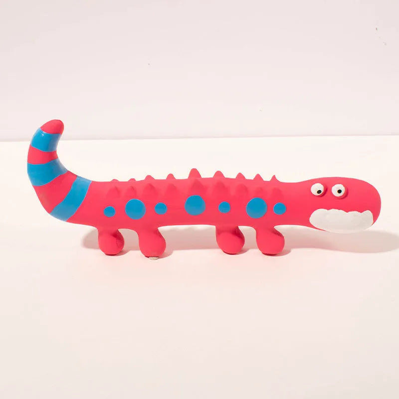 Green lizard-shaped dog chew toy with textured surface and squeaker for teeth cleaning